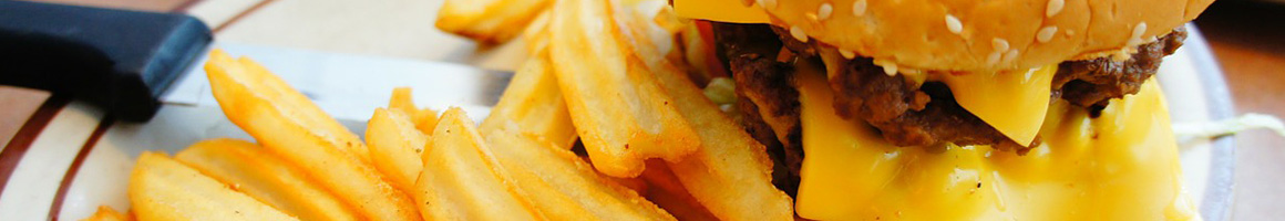 Eating American (Traditional) Burger Fish & Chips Chicken at Hook Fish & Chicken restaurant in Cincinnati, OH.